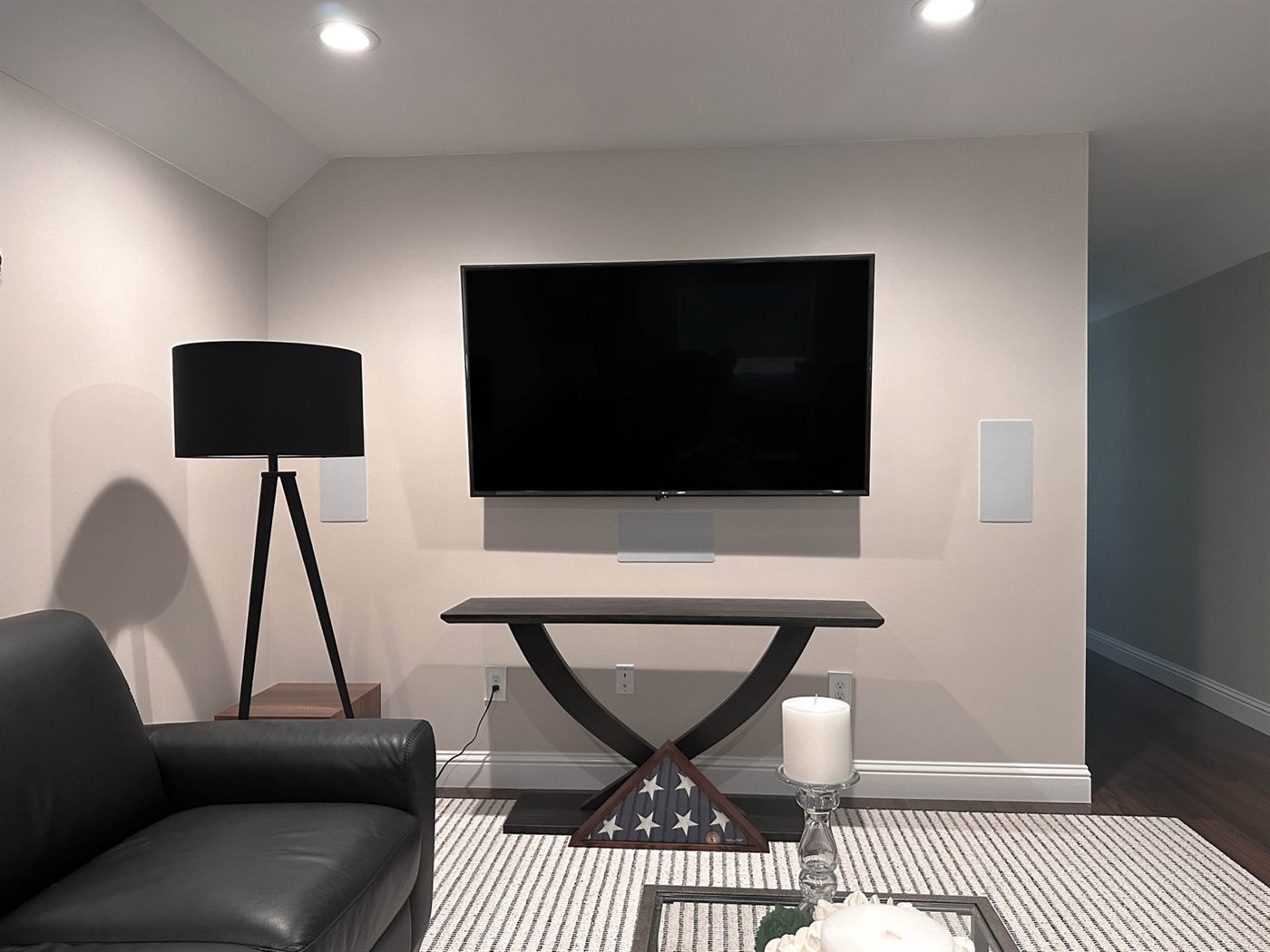 Ellisville TV wall with in-wall speakers, a soundbar, and every cable hidden in the wall